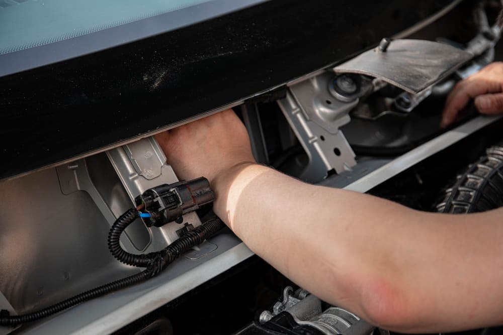 Fitting an immobiliser's wiring behind a panel